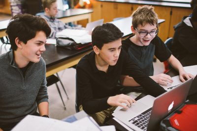 MIddle School students at a computer