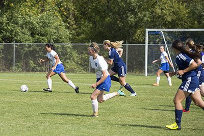 MPA students playing soccer