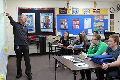 Math teacher with middle school students