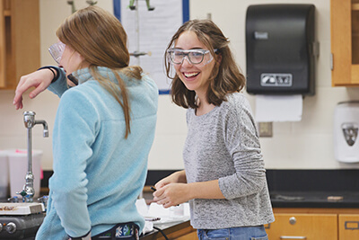 High school student in science classroom