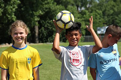 Students playing soccer