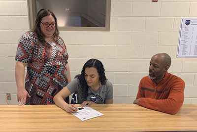 Maia Kelly signing letter of intent