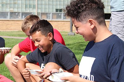 middle schoolers enjoying the ice cream social