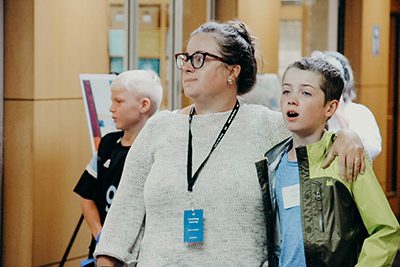 mpa parent wearing a parent nametag