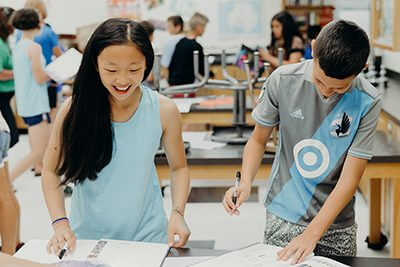 middle school students in the science lab