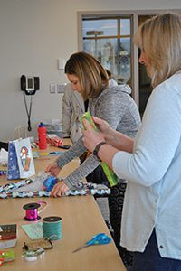 parents association wrapping gifts for faculty and staff