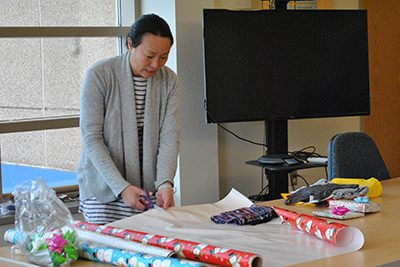 PA wrapping gifts for faculty and staff appreciation