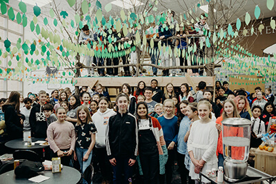 the middle school posing at the middle school cafe