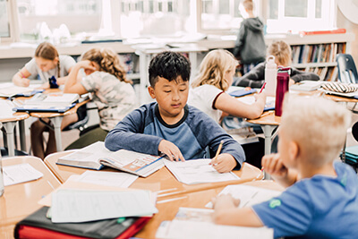 middle school student working in group