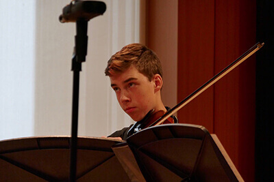 Ian Snider playing his instrument