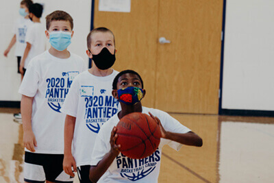 masked athletes at summer basketball camp