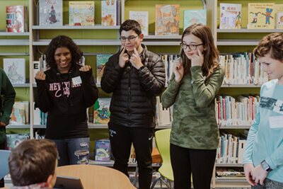 Ishika and other students playing charades