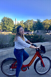 Katherine Garvey on a bicycle