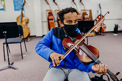 Ibrahim Playing the Violin