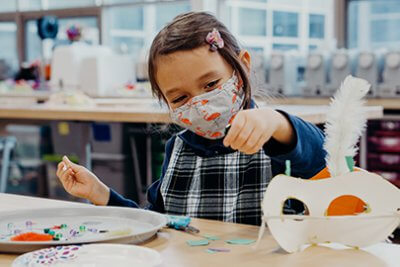 Kindergarten student working in the Makerspace