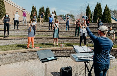 choir singing for the first time on campus this year