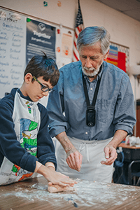 Mr. Wilson working with fourth grader