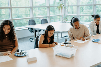 Two students working in the PCR