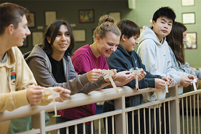 9th graders doing a physics experiment