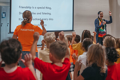 lower school students at their character assembly