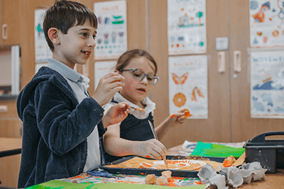 Lower School students working in art class together