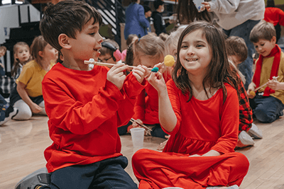 Two Lower School students during the CNY celebration. 