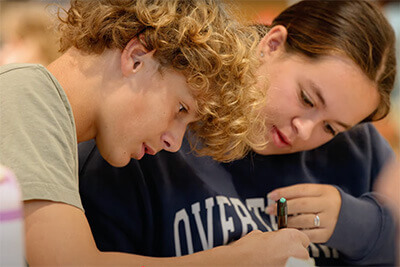 Middle School students working on homework together