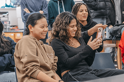 Upper School students laughing. 