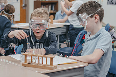 Lower School students doing a chemistry lab together