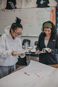 Upper school students working together in class