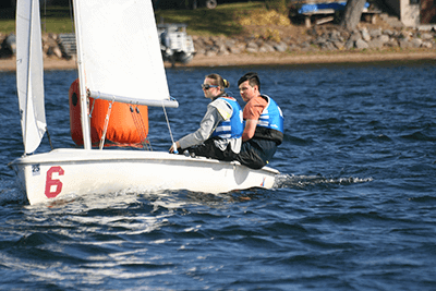 Members of the MPA spring sailing team man a boat. 