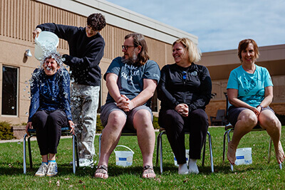 Upper School faculty members participate in the Ice Bucket Challenge. 