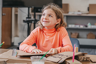 Lower School student listening to instructions at summer camp