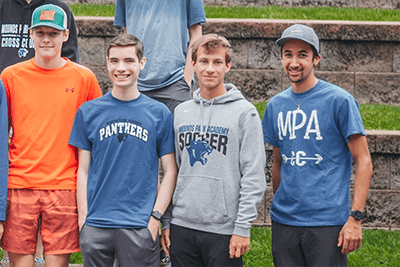 Alumni Declan Dahlberg '18 and his athletes. 