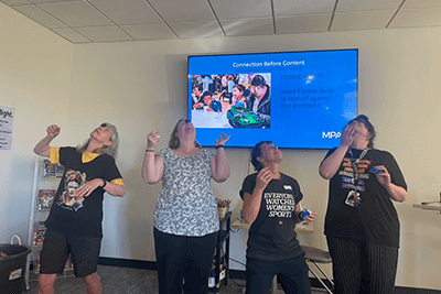 Lower School staff playing "cookie face"