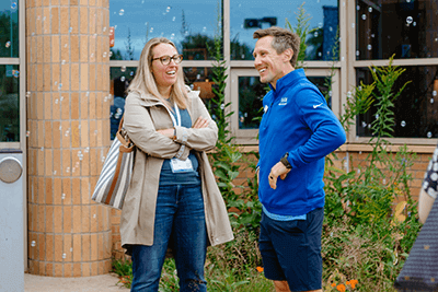 A teacher and an MPA parent chatting. 