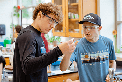 Upper School students working on a lab in chemistry.