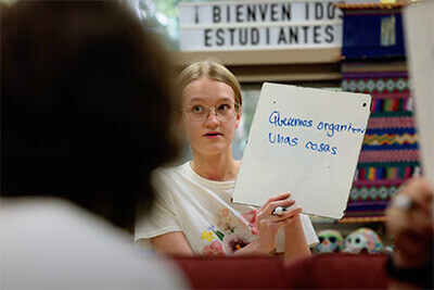 Upper School student participating in Spanish class