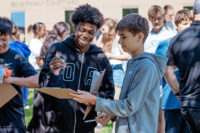 Two MPA students working together. 