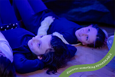 Two girls looking up. Private School Admissions