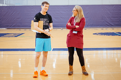 Feature image of two MPA parents chatting. 