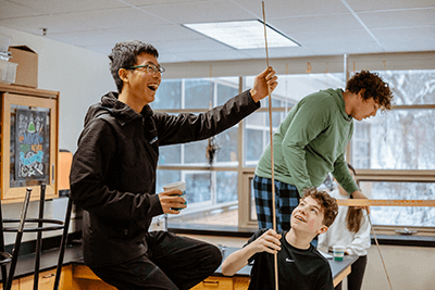 Two students working on a project together