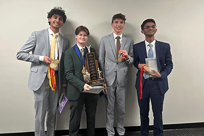 Members of the MPA speech team pose with awards