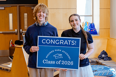 Two members of the Class of 2026 smiling