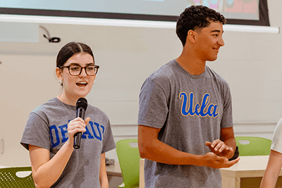 two students in college gear