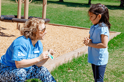 a student and teacher working together